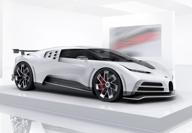 Powszechnie znane jest zamiłowanie Cristiano Ronaldo do pięknych i szybkich samochodów. Niedługo w jego pojemnym garażu stanie unikatowe Bugatti, model Centodieci.
Fot. Bugatti Powszechnie znane jest zamiłowanie Cristiano Ronaldo do pięknych i szybkich samochodów. Niedługo w jego pojemnym garażu stanie unikatowe Bugatti, model Centodieci.
Fot. Bugatti